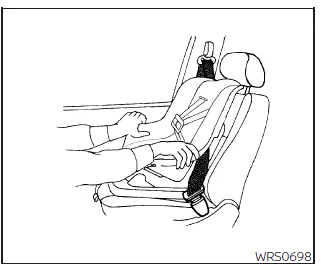 Nissan Frontier checking stability of installed forward facing child seat step 8