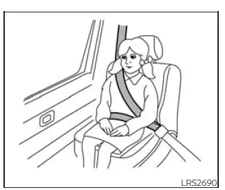 Nissan Frontier child properly secured in booster seat with correct seat belt positioning
