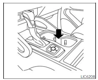 Nissan Frontier front cup holders integrated into center console for driver and passenger