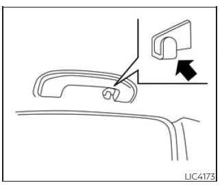 Nissan Frontier rear assist grip coat hook for hanging garments