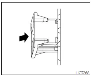 Nissan Frontier extended storage switch pushed position indicating ON mode