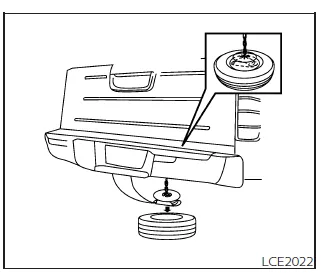 Nissan Frontier lowering spare tire using jacking rod and winch mechanism