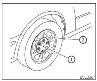 Nissan Frontier spare tire mounting plate and chain positioning illustration