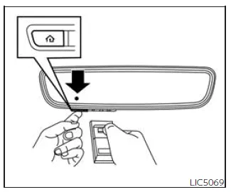Nissan Frontier HomeLink programming process using handheld remote transmitter