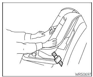 Nissan Frontier checking stability of forward facing child seat after installation step 6