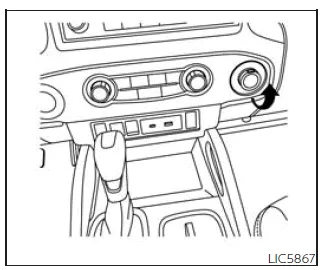 Nissan Frontier 12V power outlet located on instrument panel for charging devices