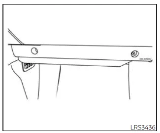 Nissan Frontier passenger side knee airbag location in knee bolster