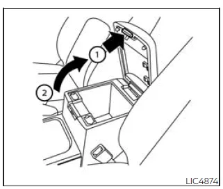 Nissan Frontier center console storage box with opening lever