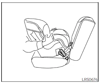 Nissan Frontier checking child seat stability after installation step 4
