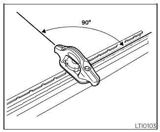 Nissan Frontier tie-down cleat insertion step with bolt loosened